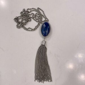 Silver necklace with blue stone and silver chain tassel